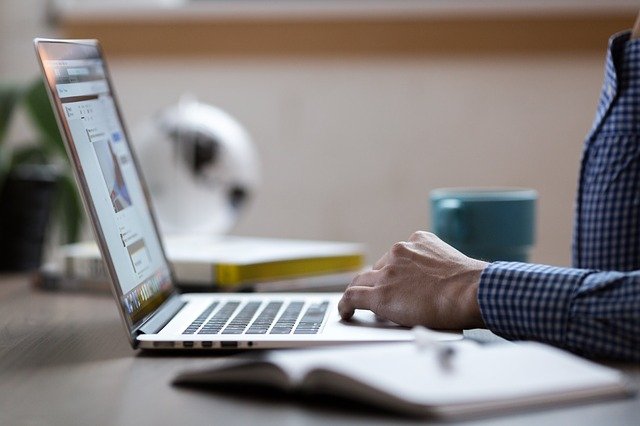 man doing Online research